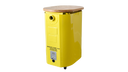 small side table made from a hydraulic reservoir from an aircraft. Cheerful yellow color. oak top made from old aircraft structures forms. hidden charging capability