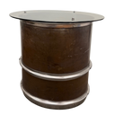 Accent table made from tailpipe assembly of a convair aircraft. oval glass top. Burnished bronze patina with polished steel rings. 25.5" high