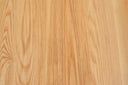 close up of a clear stained ash table surface