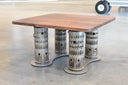 Square coffee table with a clear stained walnut wood top. Legs are 4 combustion liners from an aircraft engine. Base is aluminum powder coated organic shape to stabilize the table.